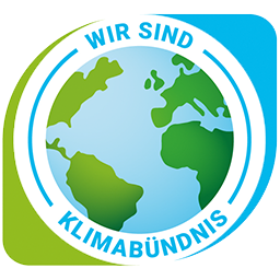 Offizielles Logo des Klimabündnis-Netzwerks mit stilisierter Weltkugel und der Aufschrift Wir sind Klimabündnis